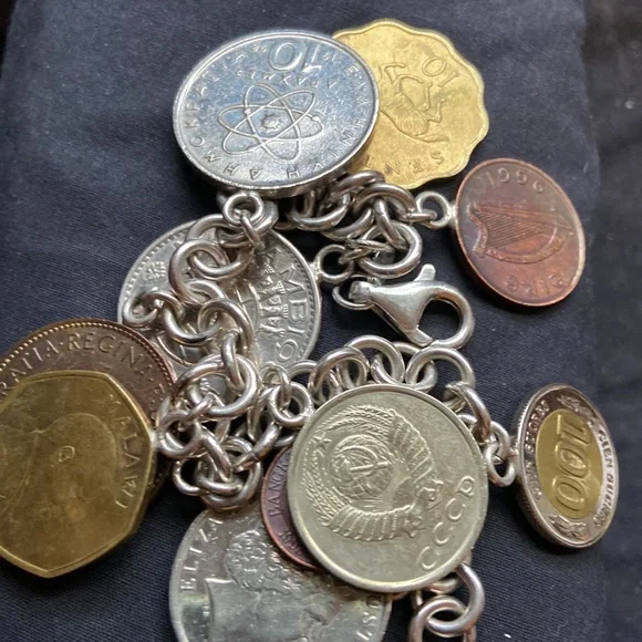 925 sterling silver coin charm bracelet 11 of them on here milor bracelet